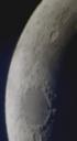 Moon through my Canon IXUS500