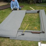 Laying on final section of felt on outer roof